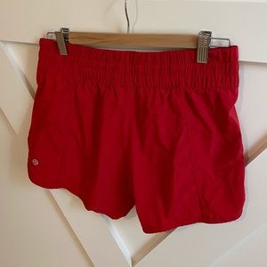 Like new Red Lululemon Tracker shorts size 8